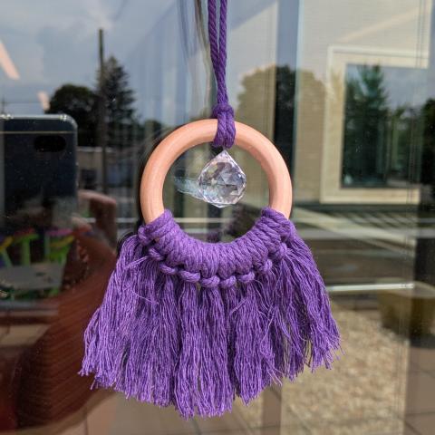 An example of the project made with purple macrame cord.