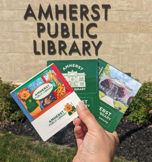 A photo of the three currently offered library card designs.